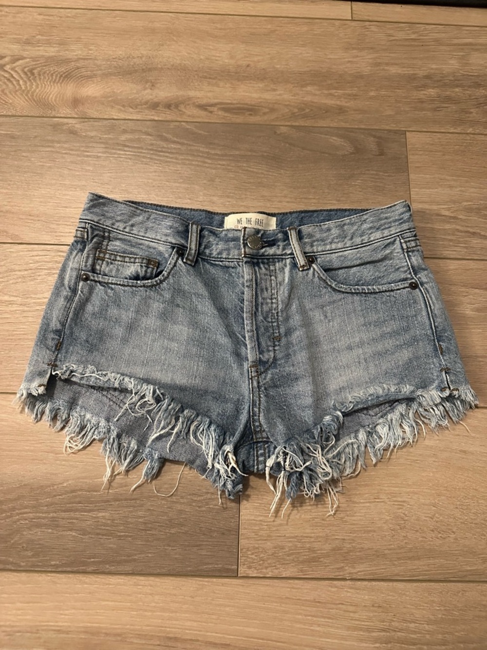 We The Free Faded Light Blue Distressed Denim Cutoff Shorts